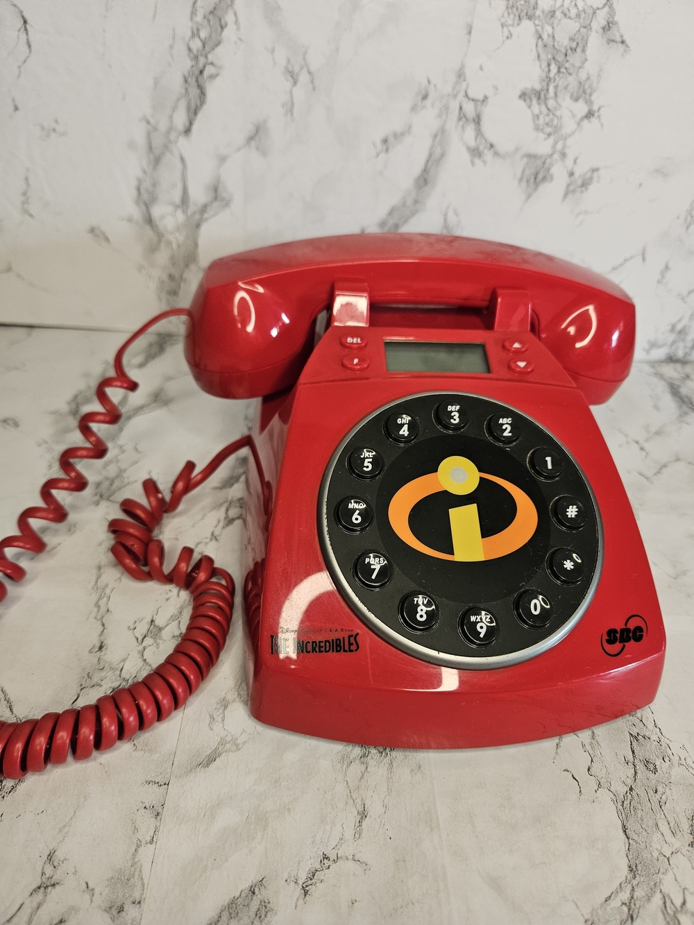 Disney Pixar "The Incredibles" themed red collector's telephone produced by SBC.